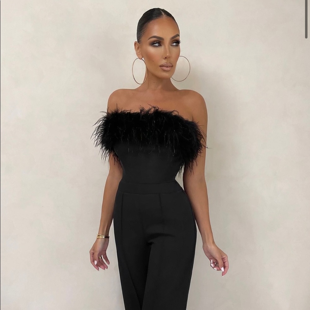 Beautiful, flattering black feather top trim jumpsuit